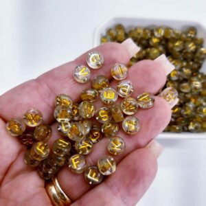 Miçanga Alfabeto Letrinha Translúcida Dourada 4x7mm- 50G