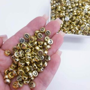 Miçanga Alfabeto Letra Arredondado Dourado 4x7mm- 50G